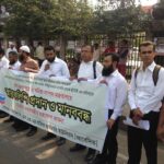 Chevron workers in Bangladesh rally for their rights.