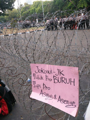 Photo from Jakarta where barbed-wire barricades used to block protestors.
