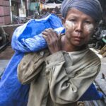 worker with minimal protection working in Yangon’s South Dagon Industrial estate - photo: David Browne