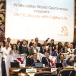 Conference delegates show their solidarity with Fujitsu workers in the UK