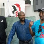 Glen Mpufane and Charles Kumbi of IndustriALL address the meeting