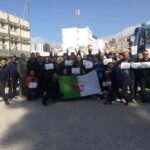 Workers show their opposition to the Algerian government in the general strike.