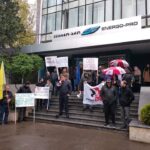 The union pickets outside the company office in April