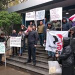 The union pickets outside the company office in April