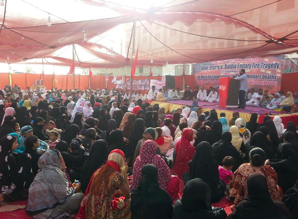 Gathered to remember the lives lost and demand compensation.